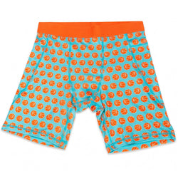 Flat lay of basketball compression shorts with basketball pattern