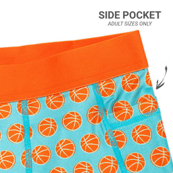 Shorts with basketball pattern and orange waistband on a blue background, labeled 'Side Pocket'.