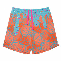 A pair of athletic shorts featuring a vibrant orange and turquoise basketball pattern with a bright pink drawstring, shown flat on a white background.