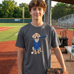 Person wearing a t-shirt with a dog graphic on a baseball field