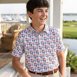 Boy wearing a patriotic themed baseaball polo shirt