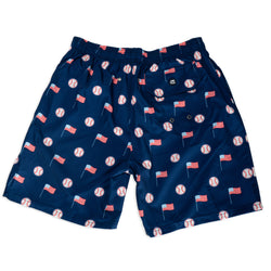Navy swim shorts with baseball and flag pattern on a white background