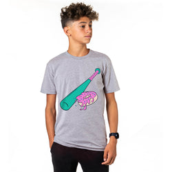 Person wearing a gray t-shirt with a colorful baseball bat and donut design on a white background