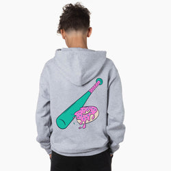 Person wearing a gray hoodie with a colorful graphic of a baseball bat and donut on the back, standing against a white background