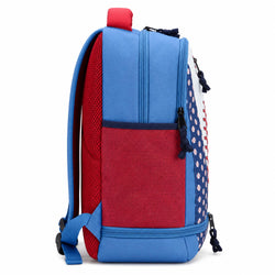 A blue and red backpack shown from the back, featuring a red mesh side pocket, a blue mesh back strap, a red top handle, and a navy blue polka-dot patterned panel on the right side.