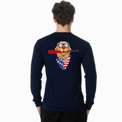Navy long-sleeve shirt with a baseball graphic of a dog wearing sunglasses and an American flag bandana on the back, displayed on a person against a white background.