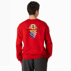 Person wearing a red sweatshirt with a graphic design on the back, standing against a white background