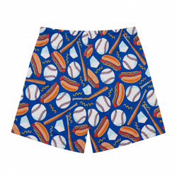 A pair of athletic shorts featuring a vibrant blue background with a repeating pattern of baseballs, hot dogs, baseball bats, and diamond shapes in orange, white, and red.