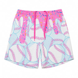 A pair of athletic shorts featuring a playful baseball patter and icecream theme. The shorts have a white base with pink and light blue baseball prints, decorated with dripping pink frosting and colorful sprinkles, and finished with a pink drawstring waist.