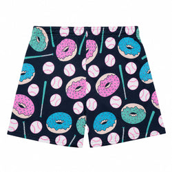 A pair of shorts featuring a playful all-over print of pink and blue donuts, baseballs, and baseball bats on a dark navy mesh fabric.