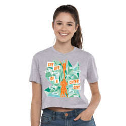 Woman wearing a gray t-shirt with a colorful cheer graphic design on a white background