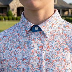 Close up of a patriotic themed polo shirt with football pattern.
