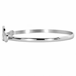 A polished silver-tone metal bangle bracelet with a flat, wide band and a simple circular clasp on the left side, shown against a plain white background.