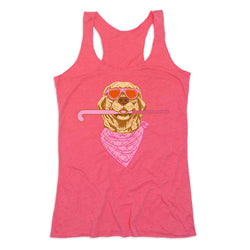 A pink racerback tank top featuring a graphic of a golden retriever dog wearing orange-tinted sunglasses, a pink bandana, and holding a pink field hockey stick in its mouth, shown against a plain white background.