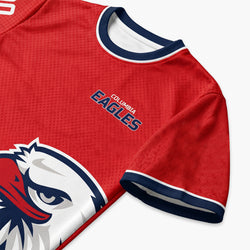Red sports tee with Columbia Eagles logo on a white background