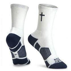 A pair of white crew socks with navy blue accents, featuring a small navy cross on the upper part of sock and navy blue ribbed panels on the heel and toe.