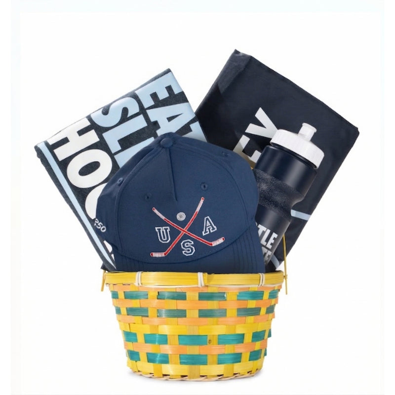 Hockey Easter Basket with a cap, water bottle, and books on a white background