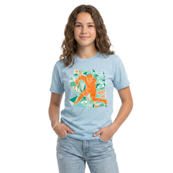 Person wearing a light blue t-shirt with a hockey girl graphic design on a white background