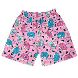 Pink swim shorts with blue and pink donut & hockey stick pattern on a white background