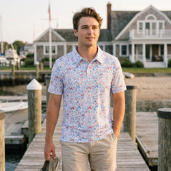 Person wearing a patriotic themed poo shirt with a hockey pattern on a dock.