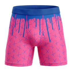Pink and blue spandex shorts with a unique hockey pattern on a white background