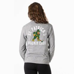 Person wearing a gray long sleeve tee with 'St. Patrick's Hockey Club' design on the back.