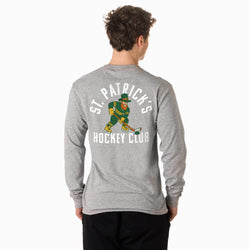 Person wearing a gray long-sleeve shirt with 'St. Patrick's Hockey Club' design on the back.