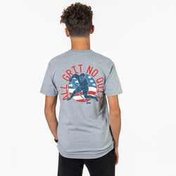 Person wearing a gray t-shirt with a hockey graphic and text on the back, on a white background