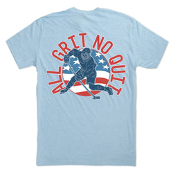 Light blue t-shirt with a graphic of a hockey player and 'All Grit No Quit' text on the back, against a white background.