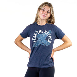 Person wearing a navy blue t-shirt with 'Fear The Keeper' graphic design on a white background