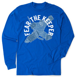 Royal blue long-sleeve shirt with a graphic of a hockey goalie and text 'FEAR THE KEEPER' on a white background