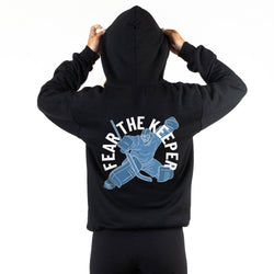 Black hoodie with 'Fear The Keeper' graphic on the back, worn by a person.