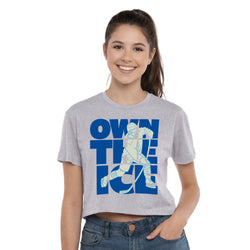 Woman wearing a gray t-shirt with 'Own the Ice' graphic design on a white background
