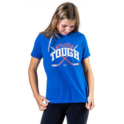 Woman wearing a blue t-shirt with 'pretty tough' text and graphic on a white background