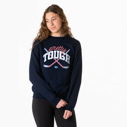Person wearing a navy blue sweatshirt with 'pretty tough' text and graphic on a white background