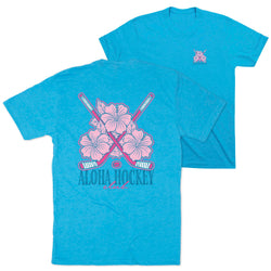 Blue t-shirt with pink floral and hockey stick design on a white background