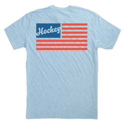 Light blue t-shirt with an American flag design and 'Hockey' text on a white background