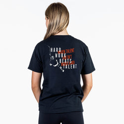 Person wearing a black t-shirt with motivational text on the back, on a white background