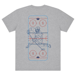 A heather gray short-sleeve t-shirt featuring a large graphic print of a hockey player in blue and red line art over a hockey rink diagram on the front.
