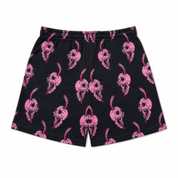Black athletic shorts with an all-over pink skull and print, featuring an elastic waistband.