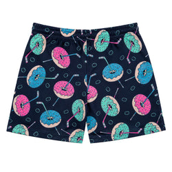 A pair of navy blue shorts featuring a playful all-over print of pink and teal frosted donuts with hockey sticks, displayed flat against a solid white background.
