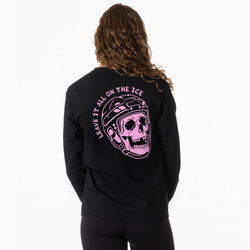A woman viewed from the back wearing a black sweatshirt with a large pink graphic of a skull in a hockey helmet and the text 'LEAVE IT ALL ON THE ICE' printed on the back.