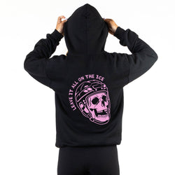 A person shown from the back wearing a black hoodie with a large pink graphic on the back featuring a skull in a hockey helmet and the text 'LEAVE IT ALL ON THE ICE'.