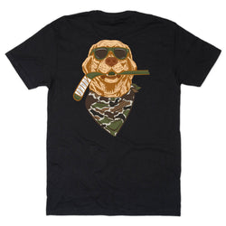 A black short-sleeve t-shirt with a graphic print of a golden retriever wearing sunglasses, a camouflage bandana, and holding a green hockey stick in its mouth, shown against a plain white background.