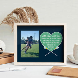 Dear Mom Girls Lacrosse wooden frame featuring a picture of a girl playing lacrosse sitting on a desk