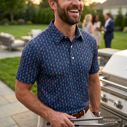 Man wearing a hockey patterned polo shirt outdoors at a bbq.