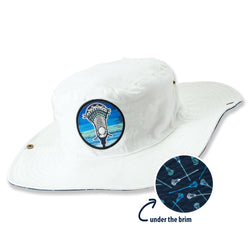White bucket hat with a blue graphic of a lacrosse ball and stick on a white background