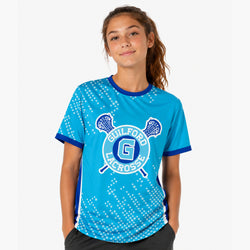 Person wearing a blue custom Guilford Lacrosse shirt on a white background
