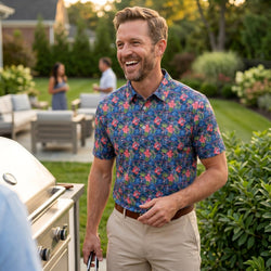 Person wearing a tropical themed polo shirt with lacrosse pattern design at a cook out.