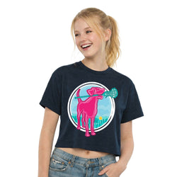 Girl wearing a navy blue t-shirt with a pink dog holding a lacrosse stick graphic.